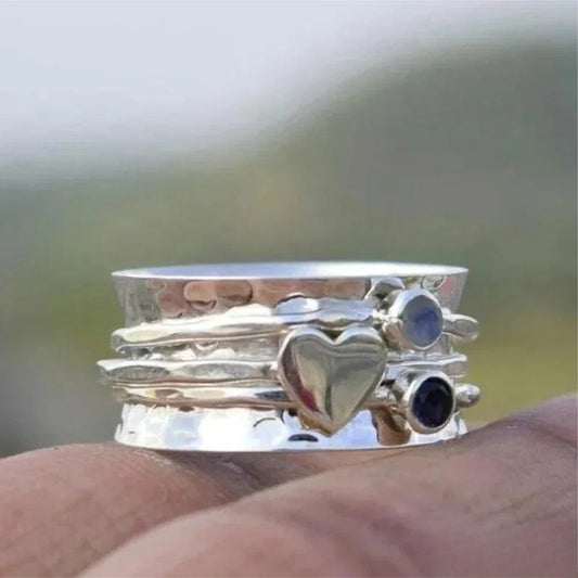 Heart-Shaped Spinner Ring with Glowing Stones
