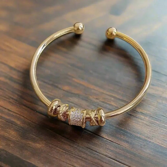 Adjustable Gold Bracelet with Charms