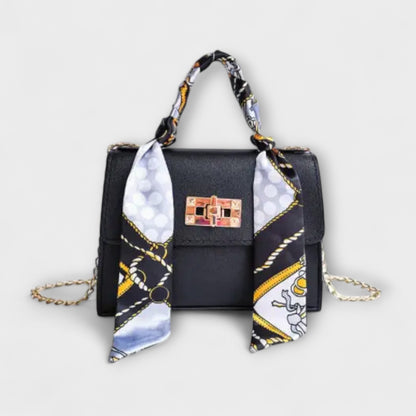 Elegant Brown Leather Handbag with Gold Closure
