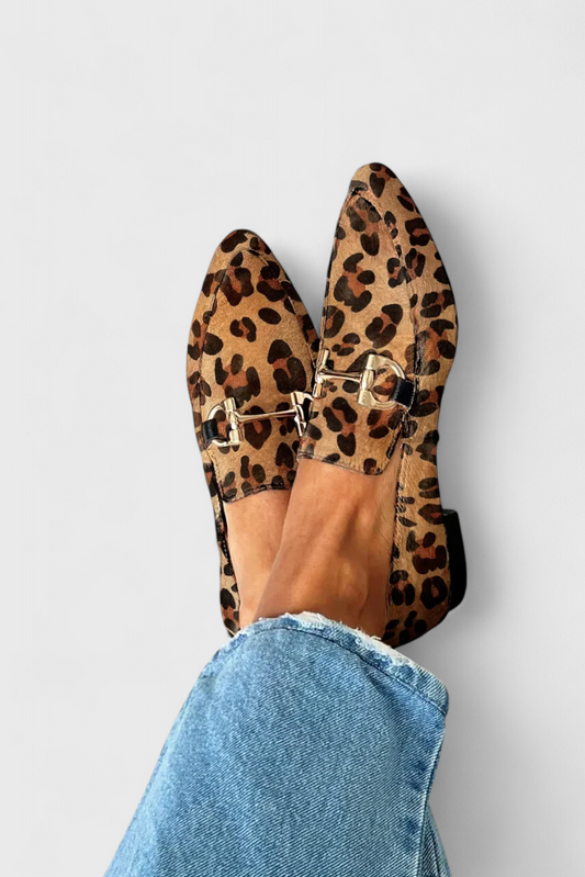 Elegant loafers for a funeral with embossed pattern and slim heel