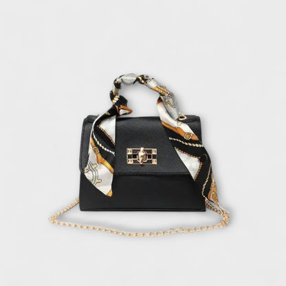 Elegant Brown Leather Handbag with Gold Closure