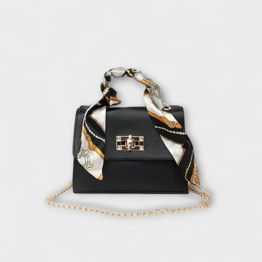 Elegant Brown Leather Handbag with Gold Closure